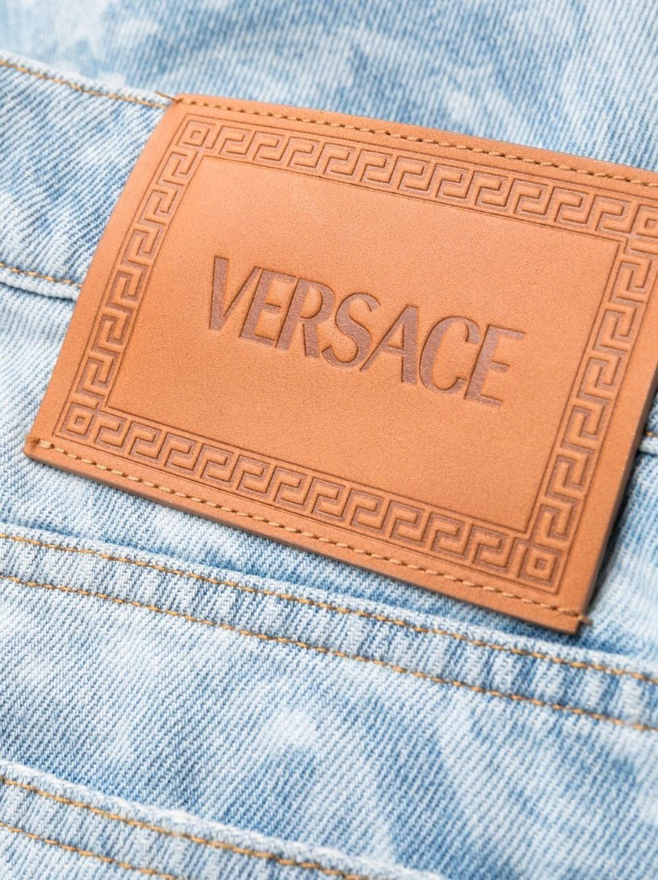 Versace All-Over Logo Jeans Blauw