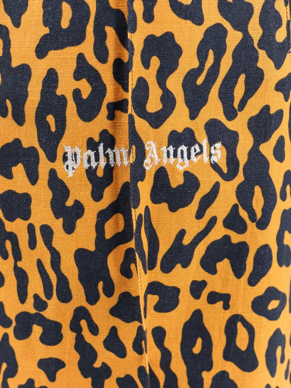 Palm Angels Linen and cotton trouser with animalier print Oranje