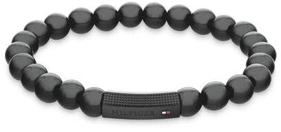 Tommy Hilfiger Tommy Hilfiger Jewels TJ2790581 Armband Heren Onyx 18cm Deze armband van Tommy Hilfiger uit de jewelry serie met nr: TJ2790581 is een opvallend model. De heren armband heeft zwarte onyx kralen geregen op elastiek draad. Tussen de edelstenen zit een Zwart