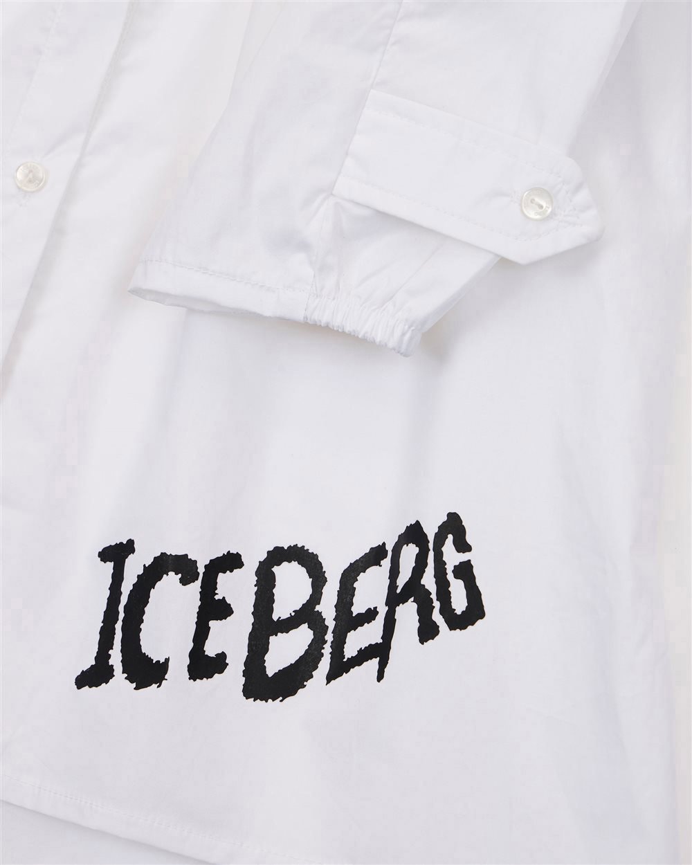 Iceberg KIDS - Long-sleeved chemisier dress in light blue fabric with contrasting Iceberg logo on the bottom Divers