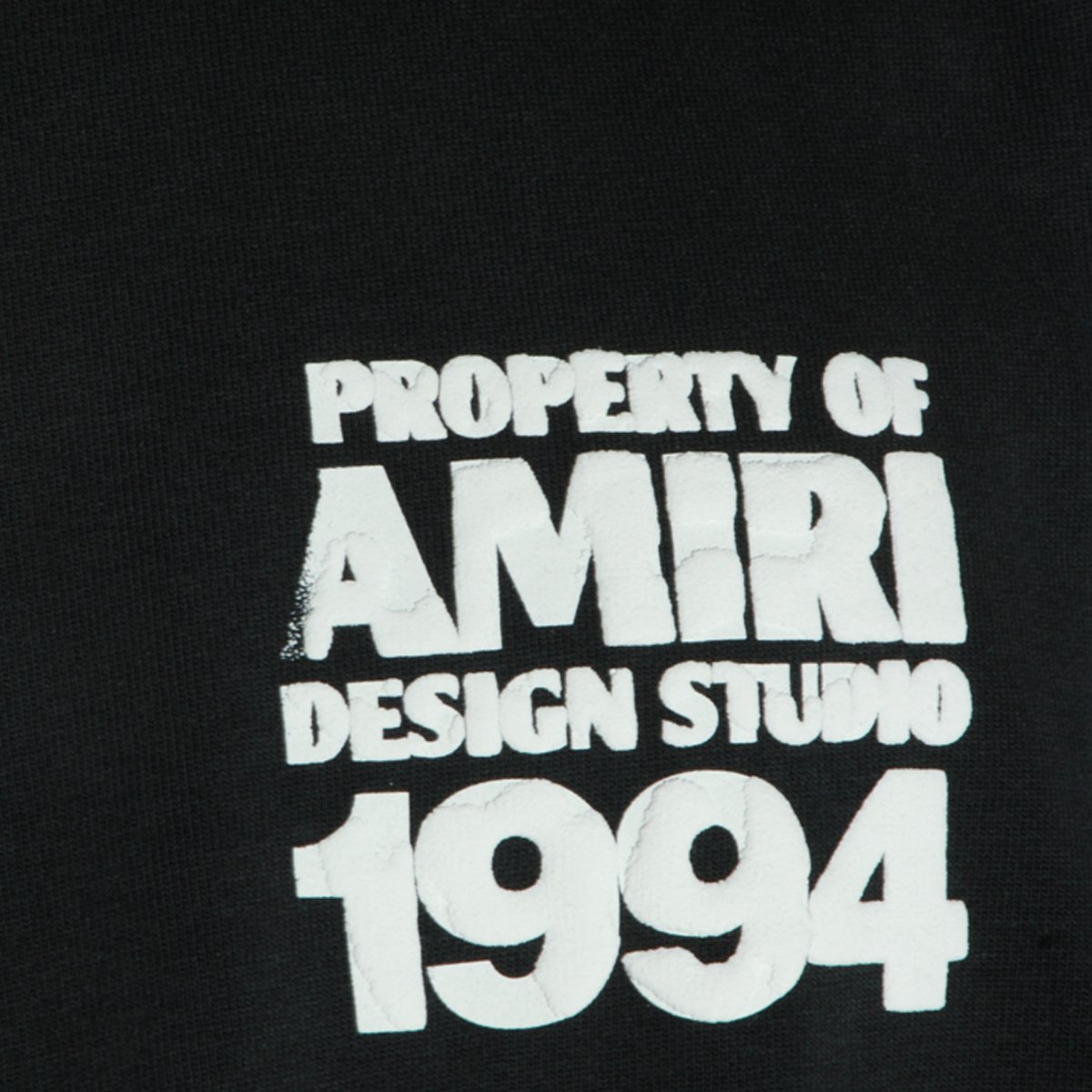 Amiri Short-Sleeve Black T-Shirt with Distressed Typography Zwart