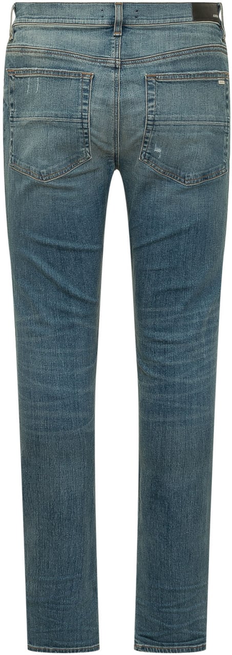 Amiri Jeans con Strappi e Cinque Tasche Blauw