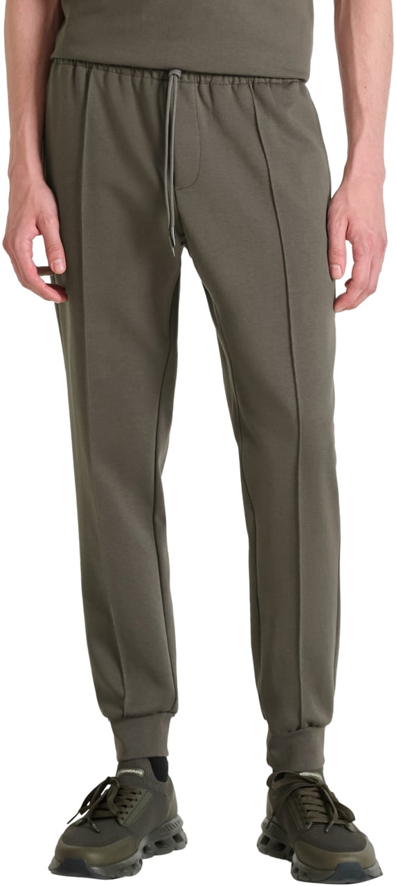 Antony Morato FLEECE TROUSERS CARROT FIT IN INTERLOCK COTTON BLEND FABRIC WITH LOGOED METAL BADGE Groen
