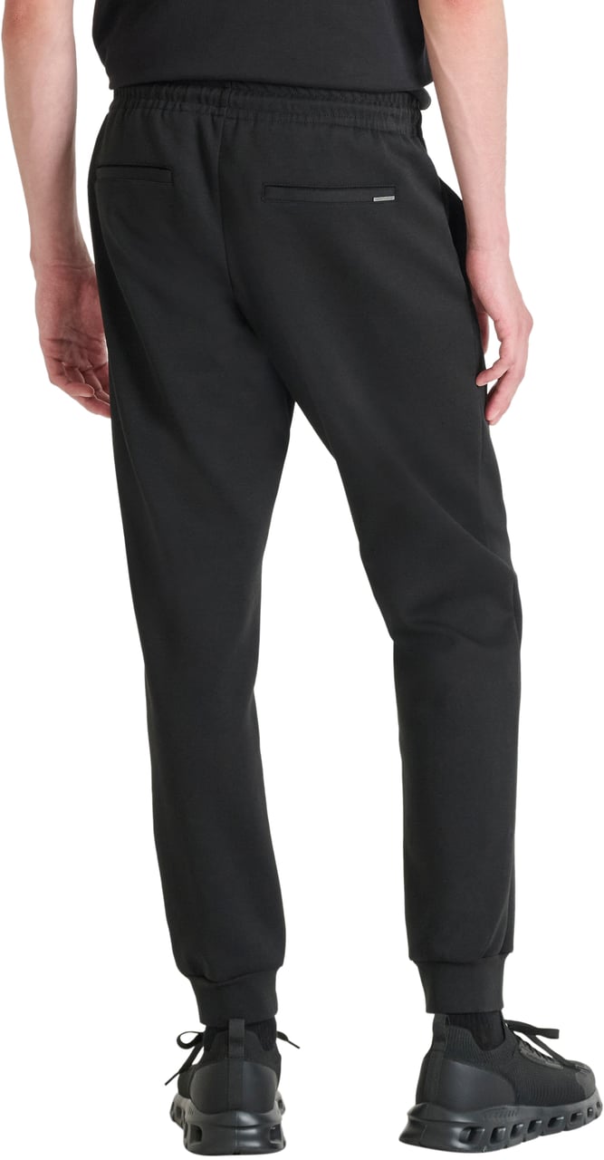 Antony Morato FLEECE TROUSERS CARROT FIT WITH LOGOED BADGE Zwart