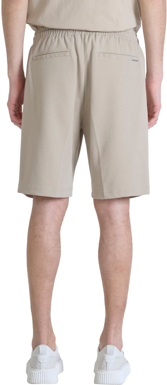 Antony Morato FLEECE SHORTS CARROT FIT IN TWILL STRETCH COTTON FABRIC  BLEND WITH LOGOED METAL BADGE Beige