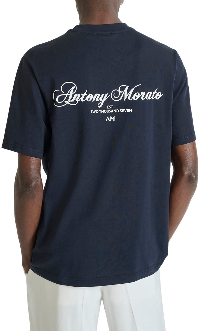 Antony Morato T-SHIRT RELAXED FIT ROUND NECK IN JERSEY COTTON FABRIC WITH PATCH PRINT AND BACK MATT PLASTIC LOGO Blauw