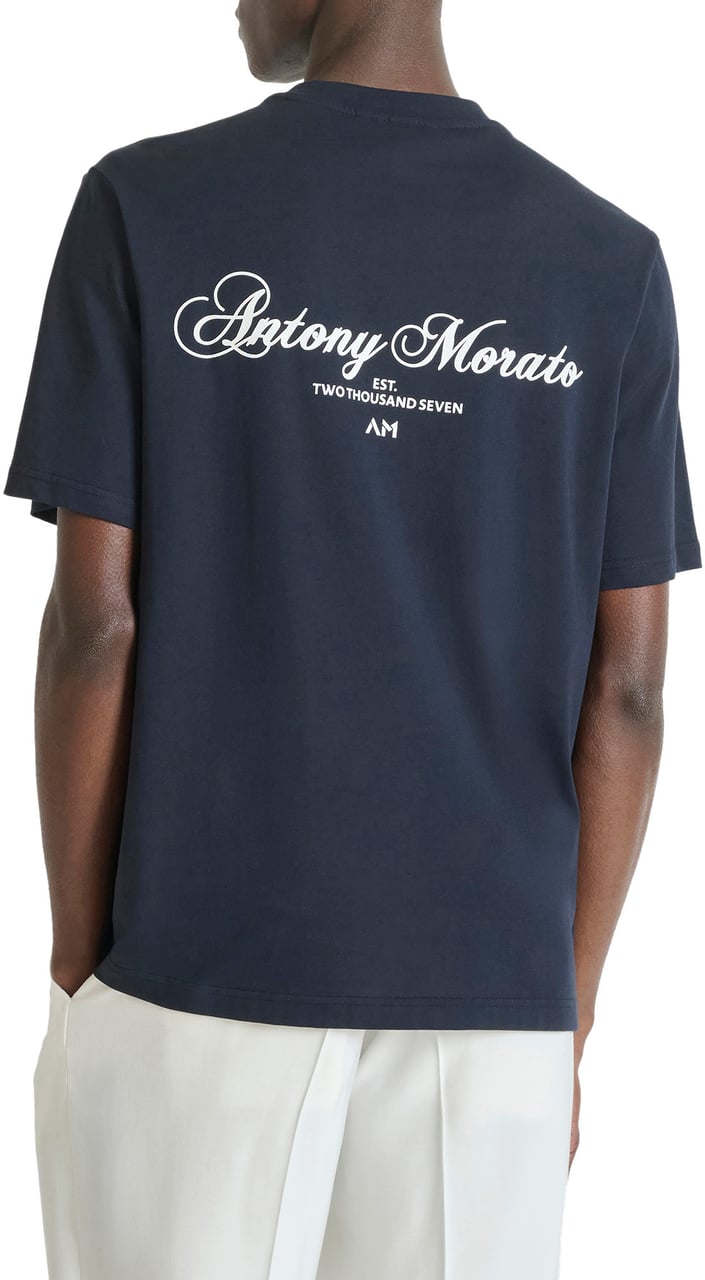 Antony Morato T-SHIRT RELAXED FIT ROUND NECK IN JERSEY COTTON FABRIC WITH PATCH PRINT AND BACK MATT PLASTIC LOGO Blauw