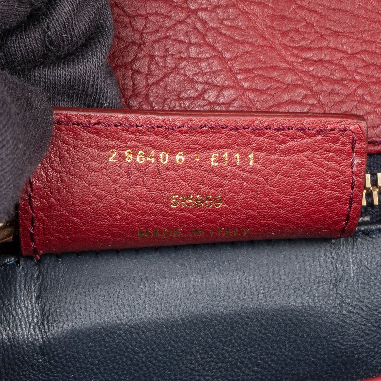 Balenciaga Pebbled Leather Toggle Clutch Rood