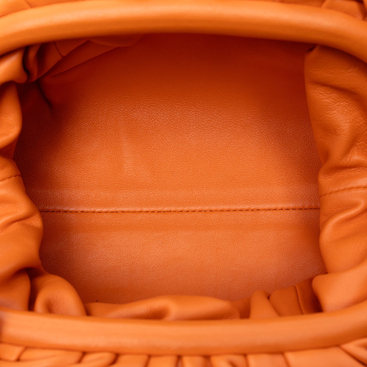 Bottega Veneta Lambskin The Mini Pouch Crossbody Oranje