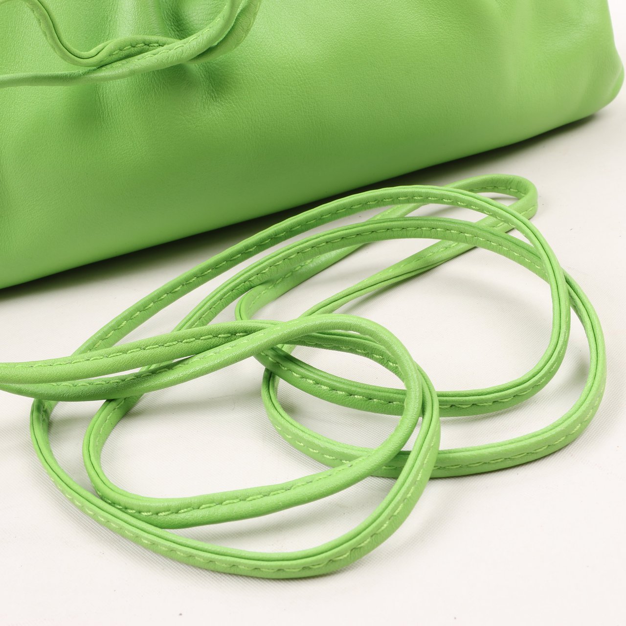 Bottega Veneta Bottega Veneta Mini The Pouch Leather Crossbody bag in Acid Green Groen