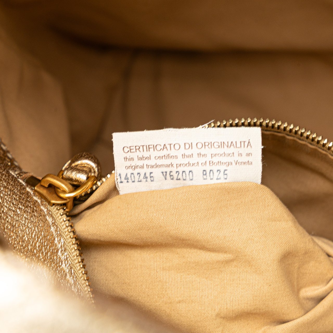 Bottega Veneta Calfskin Intrecciato Grommet Handbag Goud