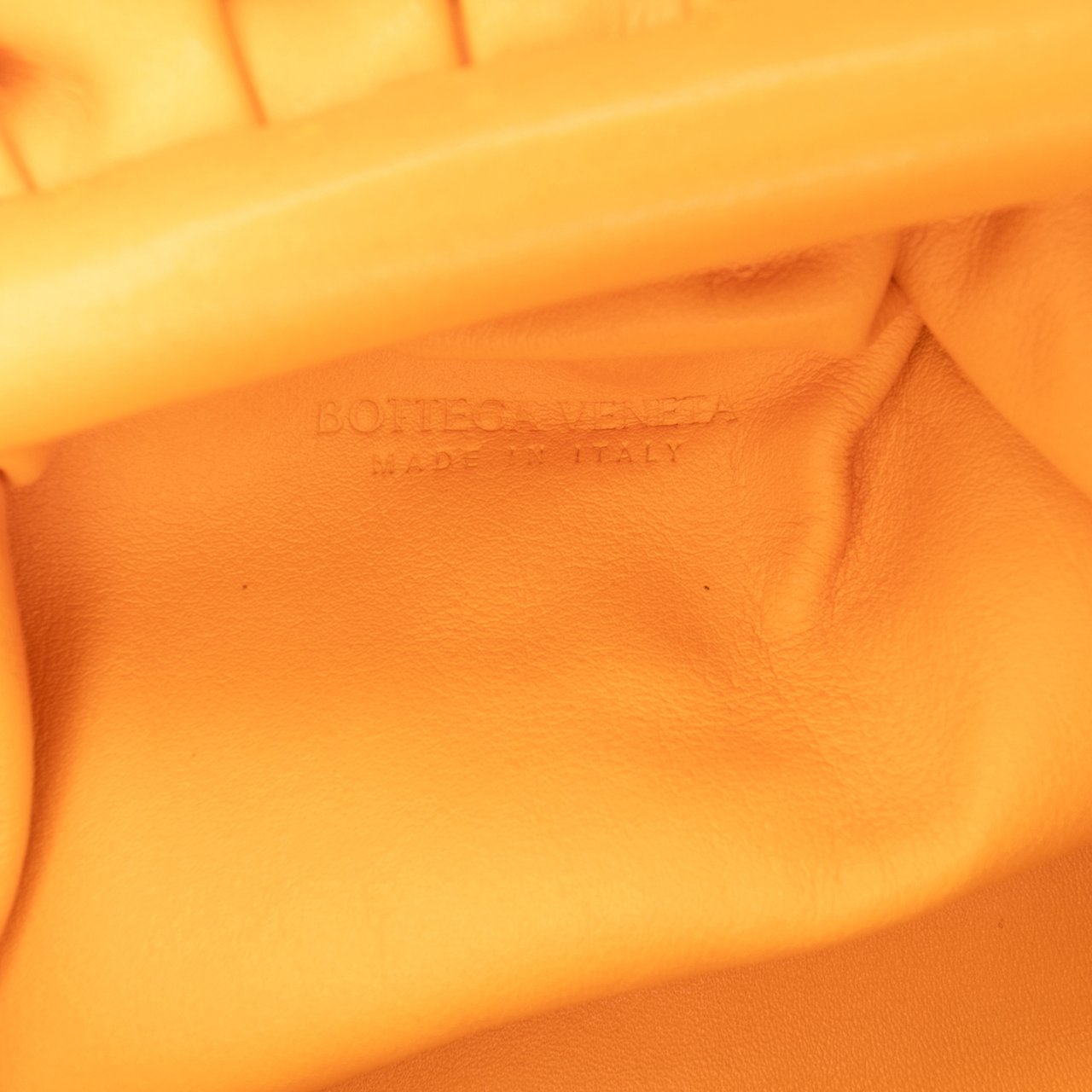 Bottega Veneta Lambskin The Mini Pouch Crossbody Oranje