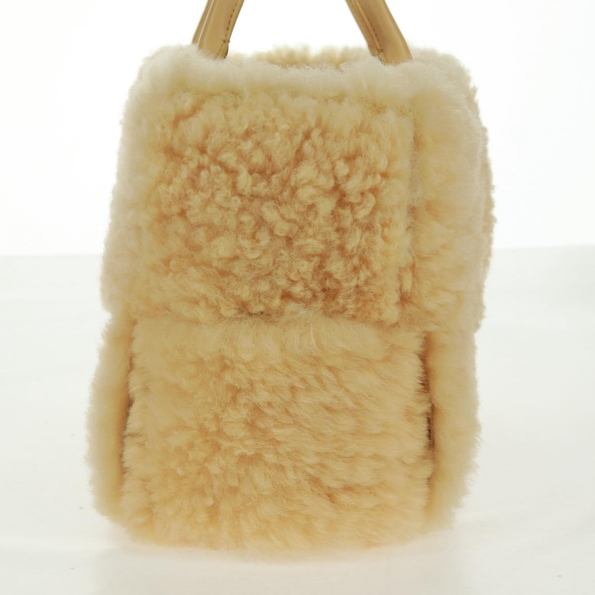 Bottega Veneta Bottega Veneta Arco Tote Intrecciato Shearling Small Geel