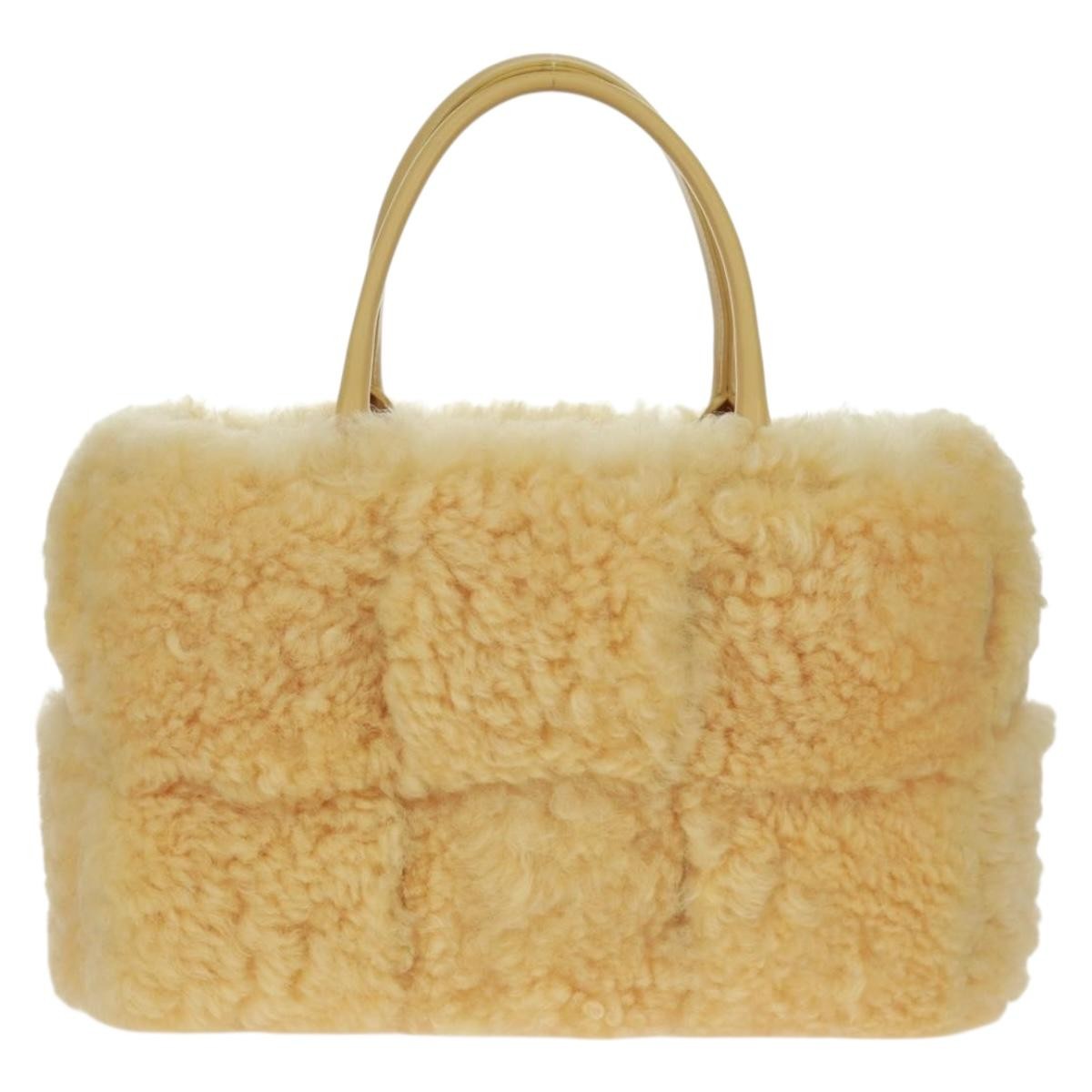 Bottega Veneta Bottega Veneta Arco Tote Intrecciato Shearling Small Geel