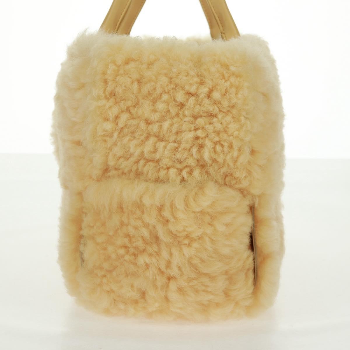 Bottega Veneta Bottega Veneta Arco Tote Intrecciato Shearling Small Geel