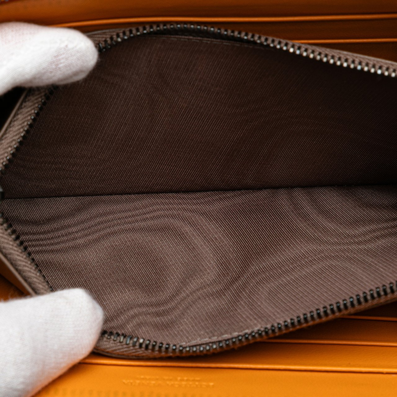 Bottega Veneta Leather Intrecciato Zip Around Wallet Oranje