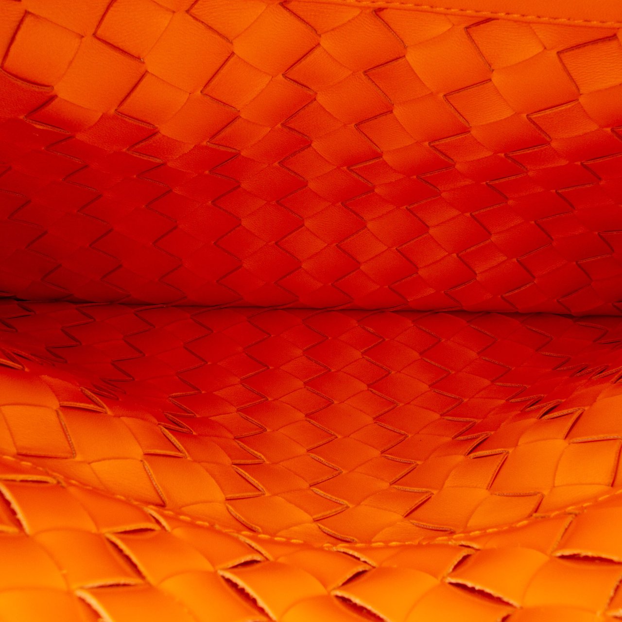 Bottega Veneta Brushed Calfskin Intrecciato Cradle Fold Over Shoulder Bag Oranje