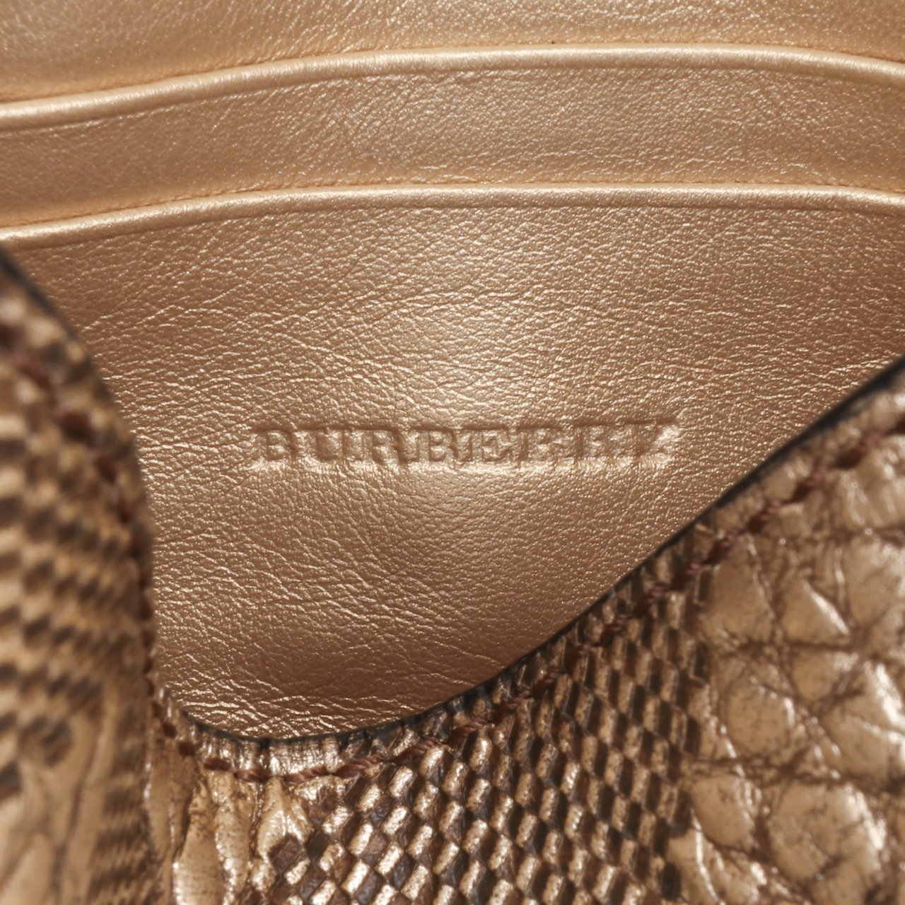 Burberry Embossed Grain Check Leather Langley Crossbody Goud