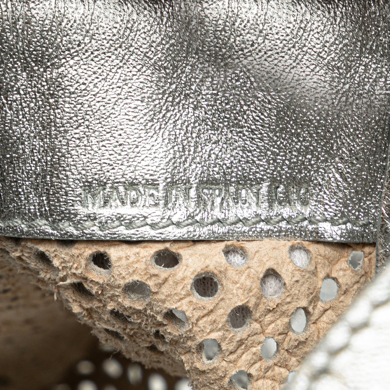 Celine Perforated Metallic Calfskin Sling Backpack Zilver