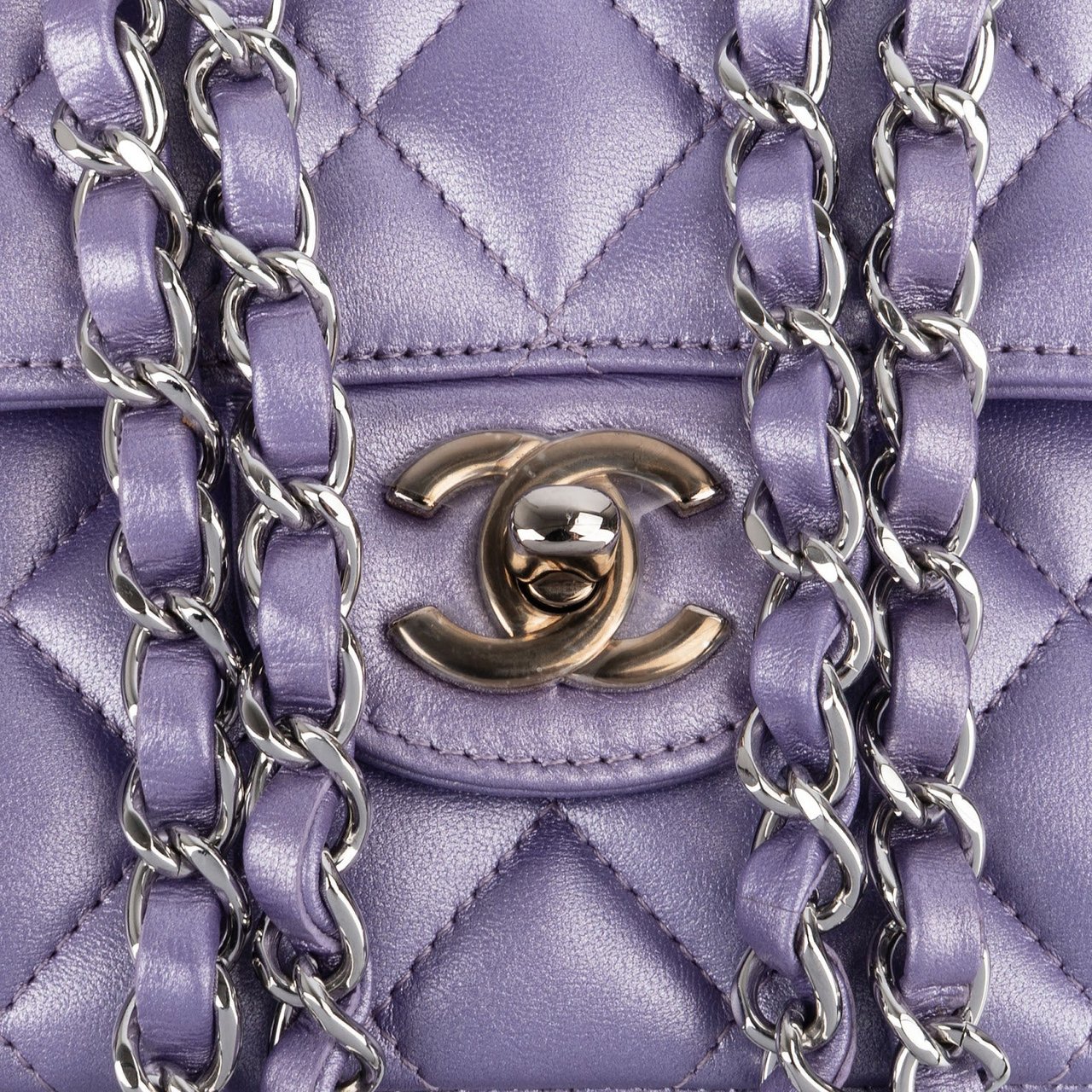 Chanel Quilted Metallic Lambskin Medium Double Flap Crossbody Bag Paars