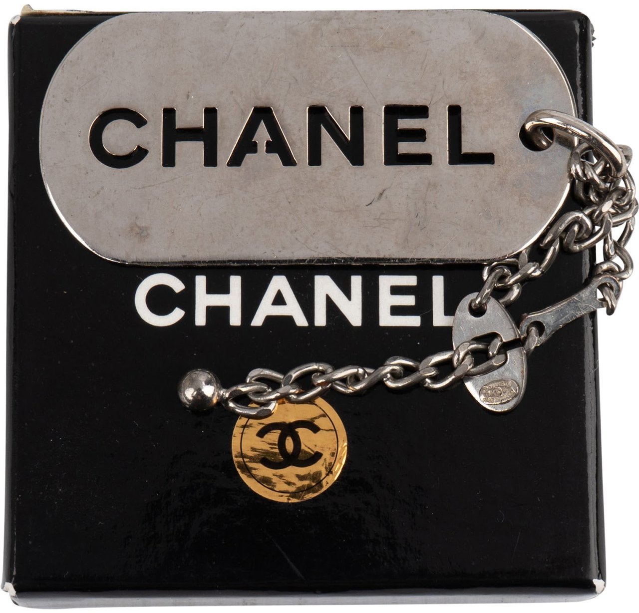 Chanel Silver Tone Dog Tag Keychain Zilver