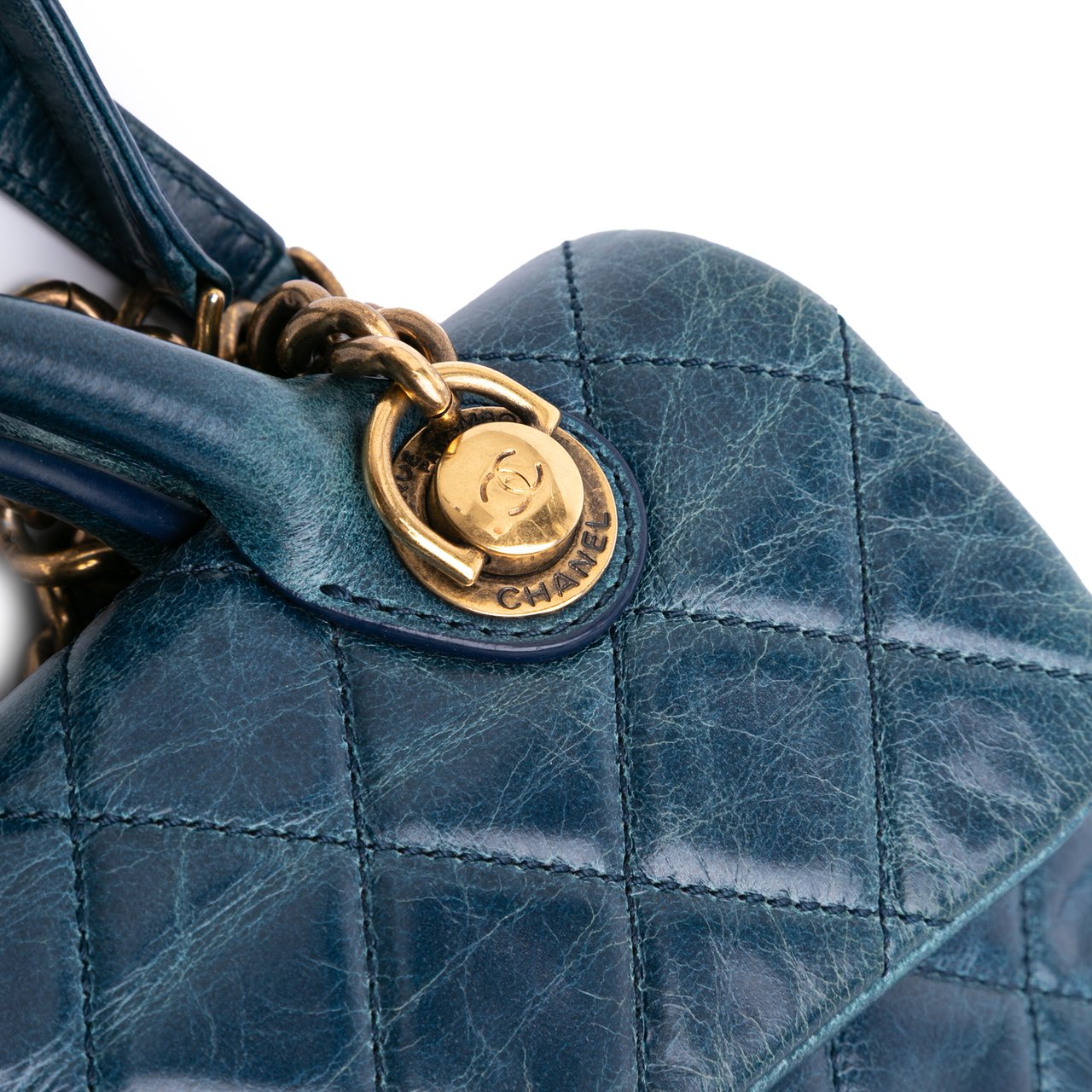 Chanel Small Glazed Calfskin Castle Rock Top Handle Flap Blauw