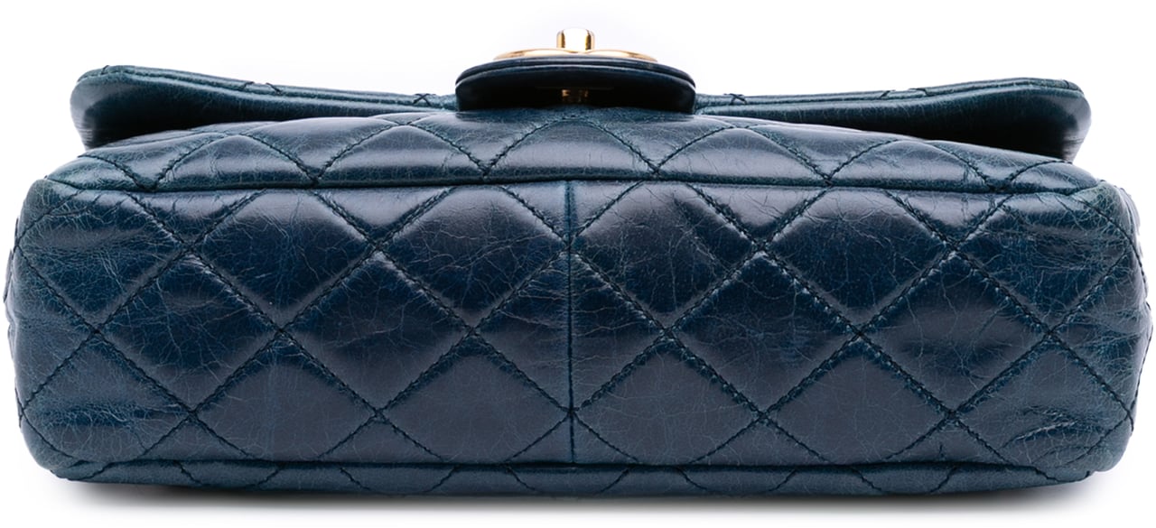 Chanel Small Glazed Calfskin Castle Rock Top Handle Flap Blauw