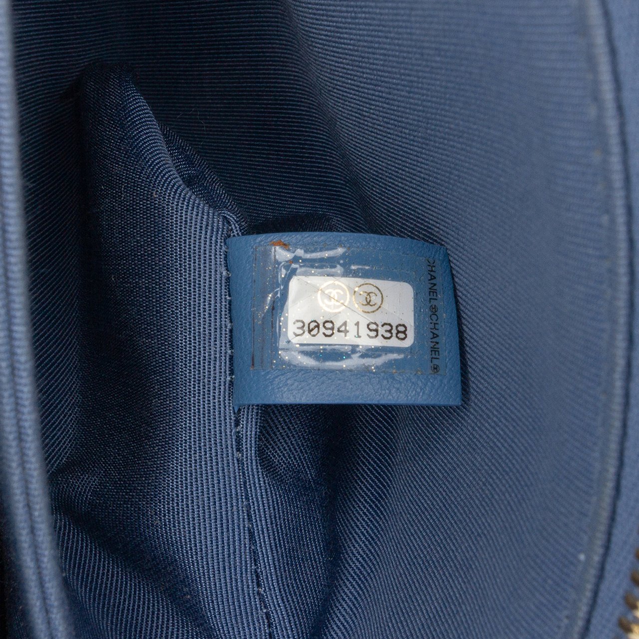 Chanel CC Quilted Lambskin Ribbon Clutch Blauw