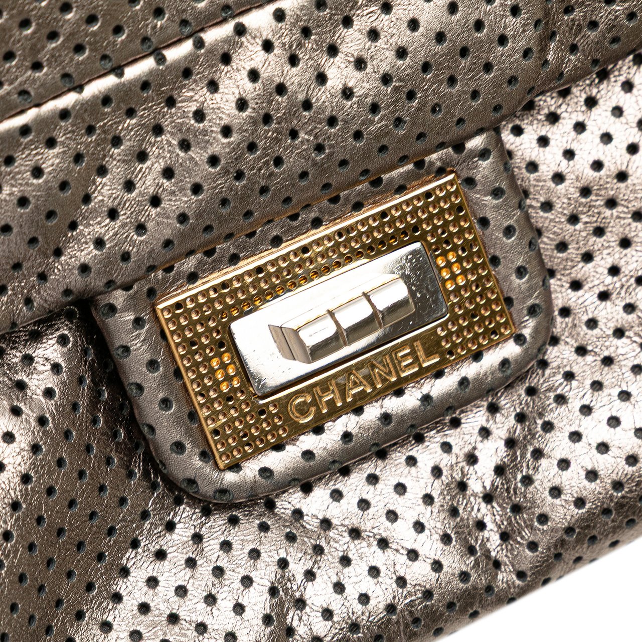 Chanel Metallic Perforated Calfskin Drill Accordion Flap Zilver