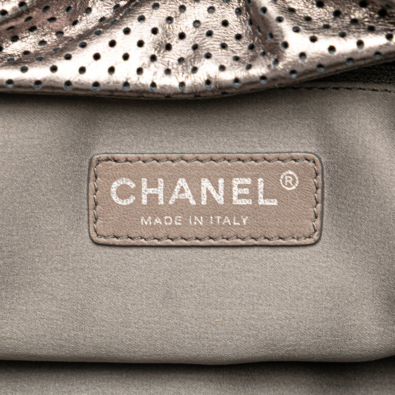 Chanel Metallic Perforated Calfskin Drill Accordion Flap Zilver