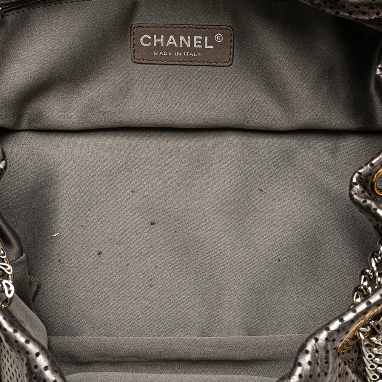 Chanel Metallic Perforated Calfskin Drill Accordion Flap Zilver