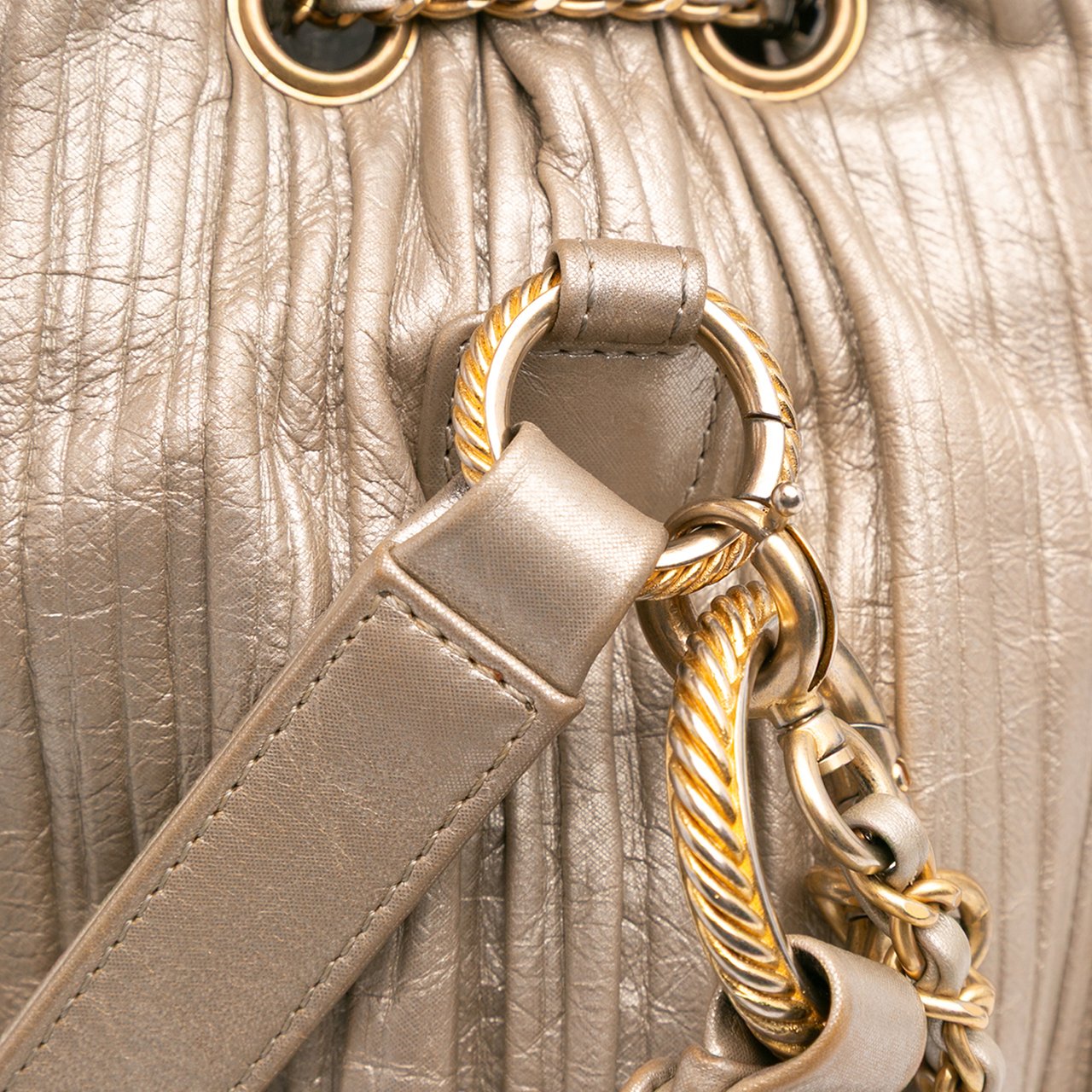 Chanel Small Metallic Calfskin Coco Pleats Drawstring Backpack Goud