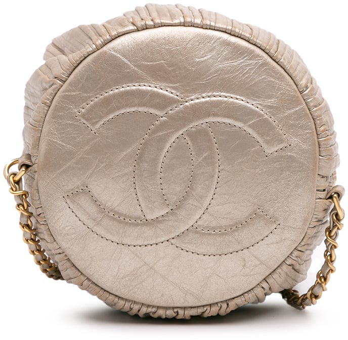 Chanel Small Metallic Calfskin Coco Pleats Drawstring Backpack Goud