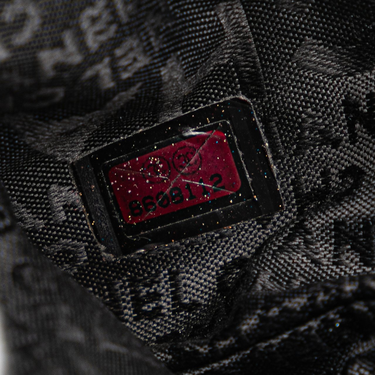 Chanel Embossed Lambskin Camellia Chain Pochette Paars