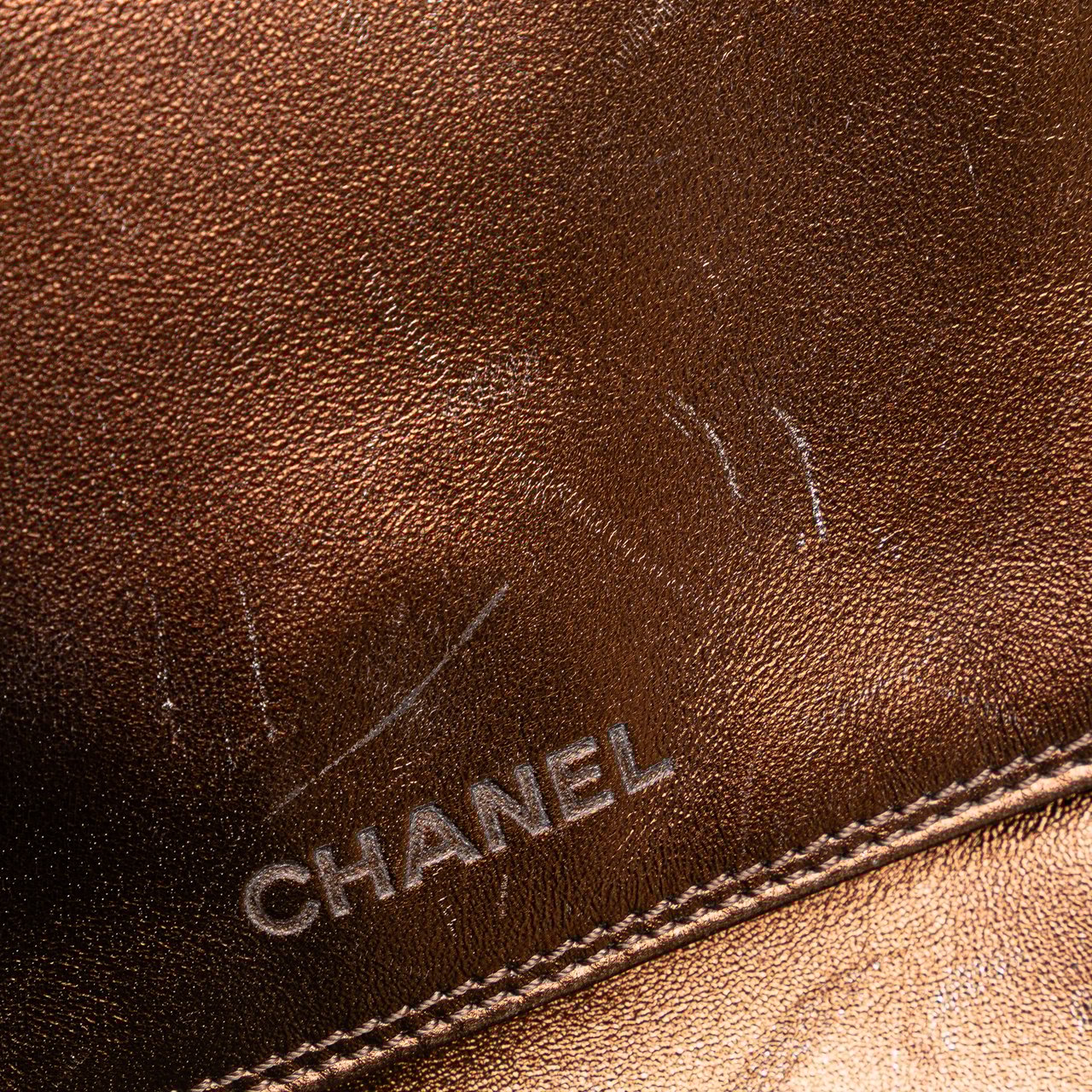 Chanel Metallic Lambskin Flap Crossbody Bruin