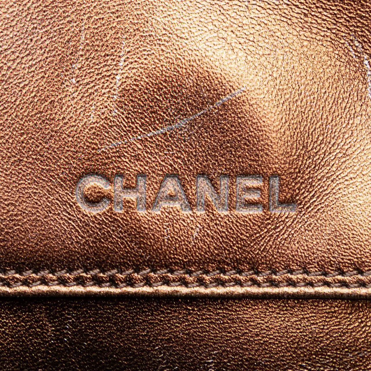 Chanel Metallic Lambskin Flap Crossbody Bruin