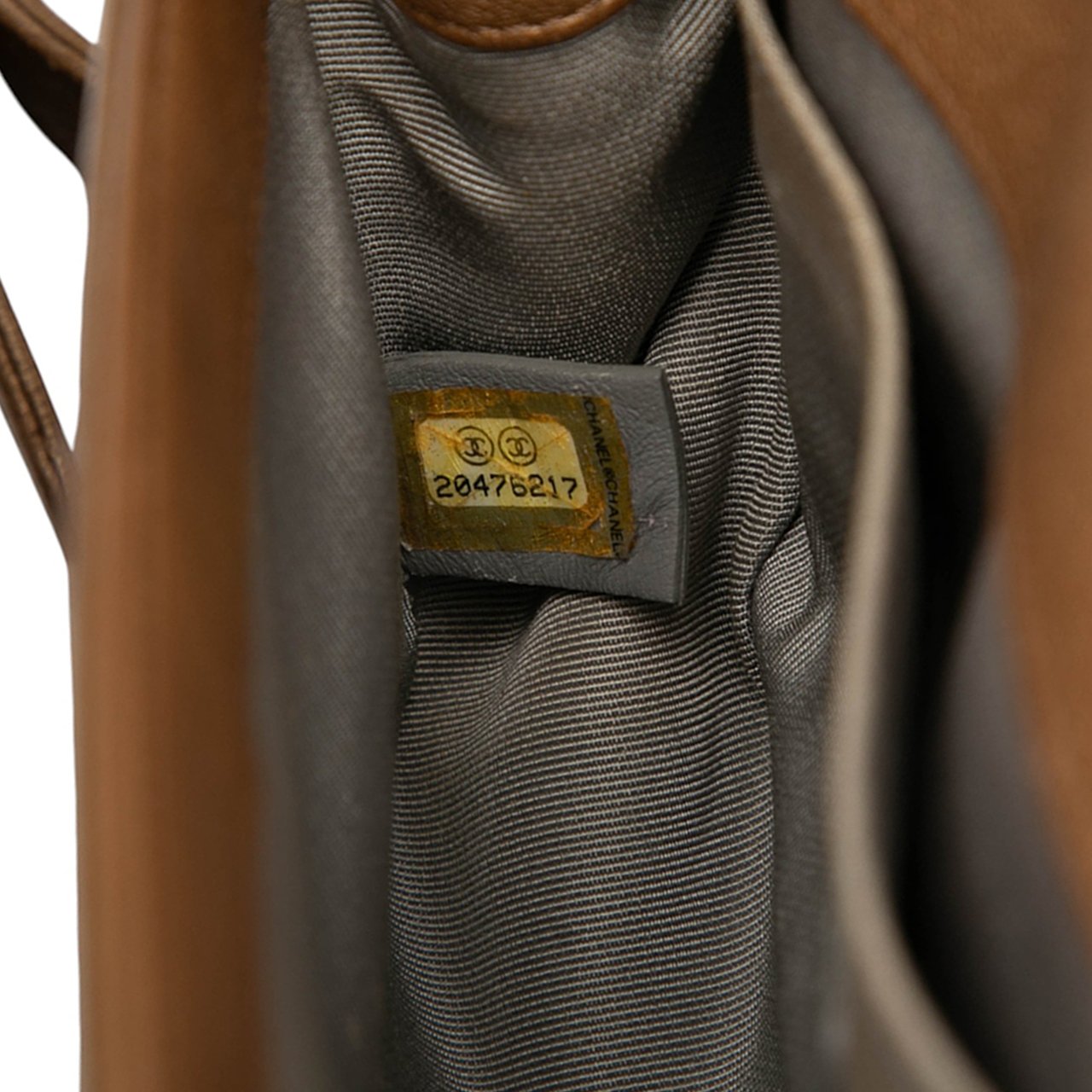 Chanel Small Quilted Metallic Lambskin Interwoven CC Boy Flap Bruin