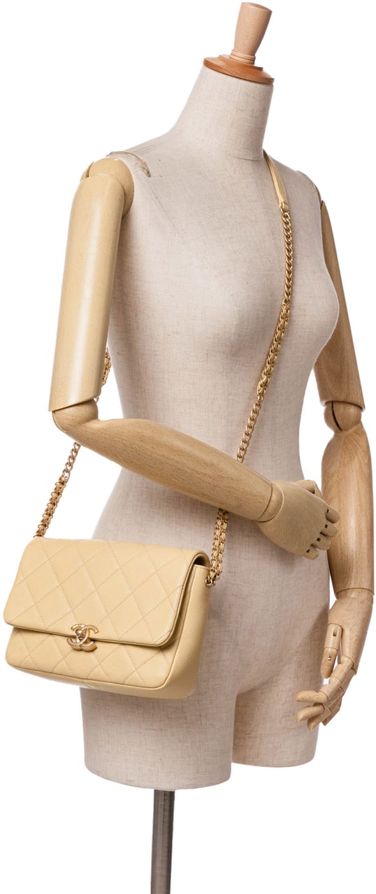 Chanel Small Quilted Caviar Chain Melody Flap Geel