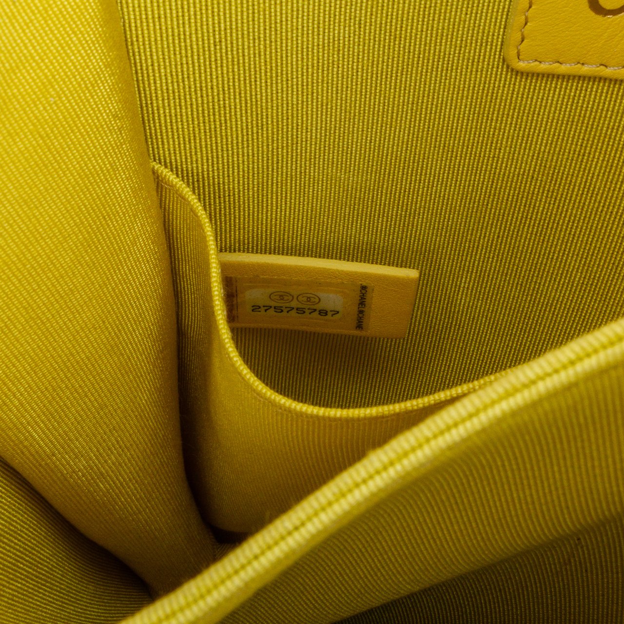 Chanel Quilted Lambskin North South Boy Flap Geel