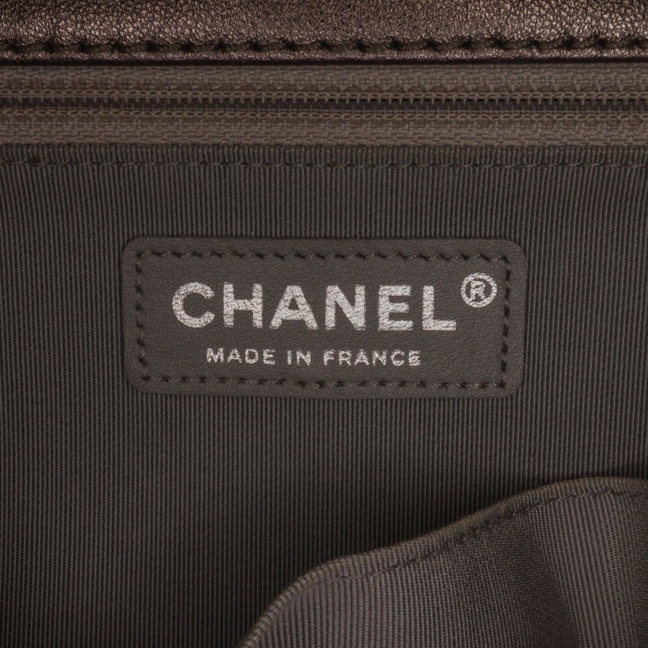 Chanel Medium Quilted Perforated Metallic Lambskin Boy Flap Grijs