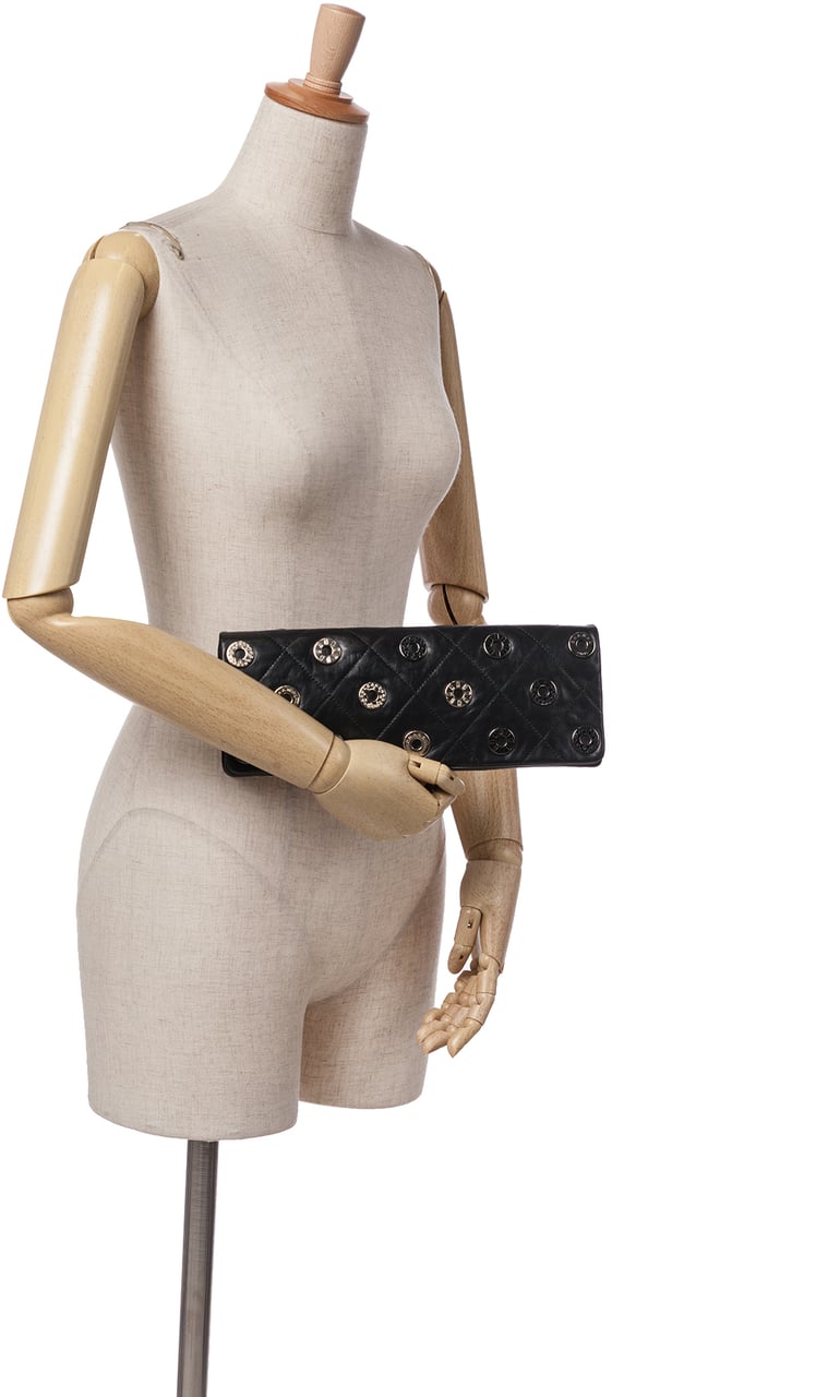 Chanel Quilted Calfskin Star Attitude Grommet Fold Over Clutch Zwart