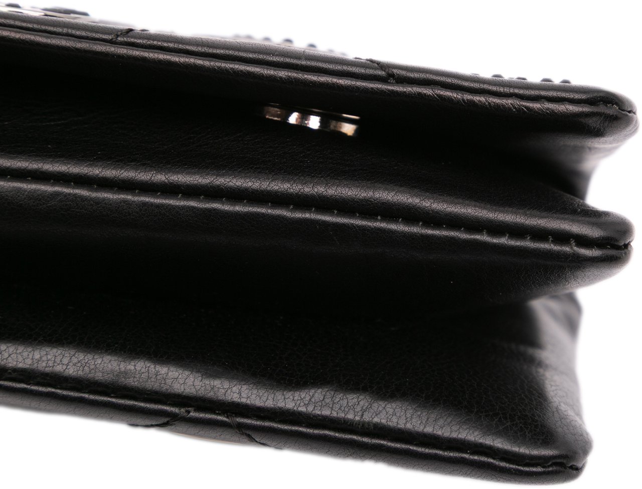 Chanel Quilted Calfskin Star Attitude Grommet Fold Over Clutch Zwart