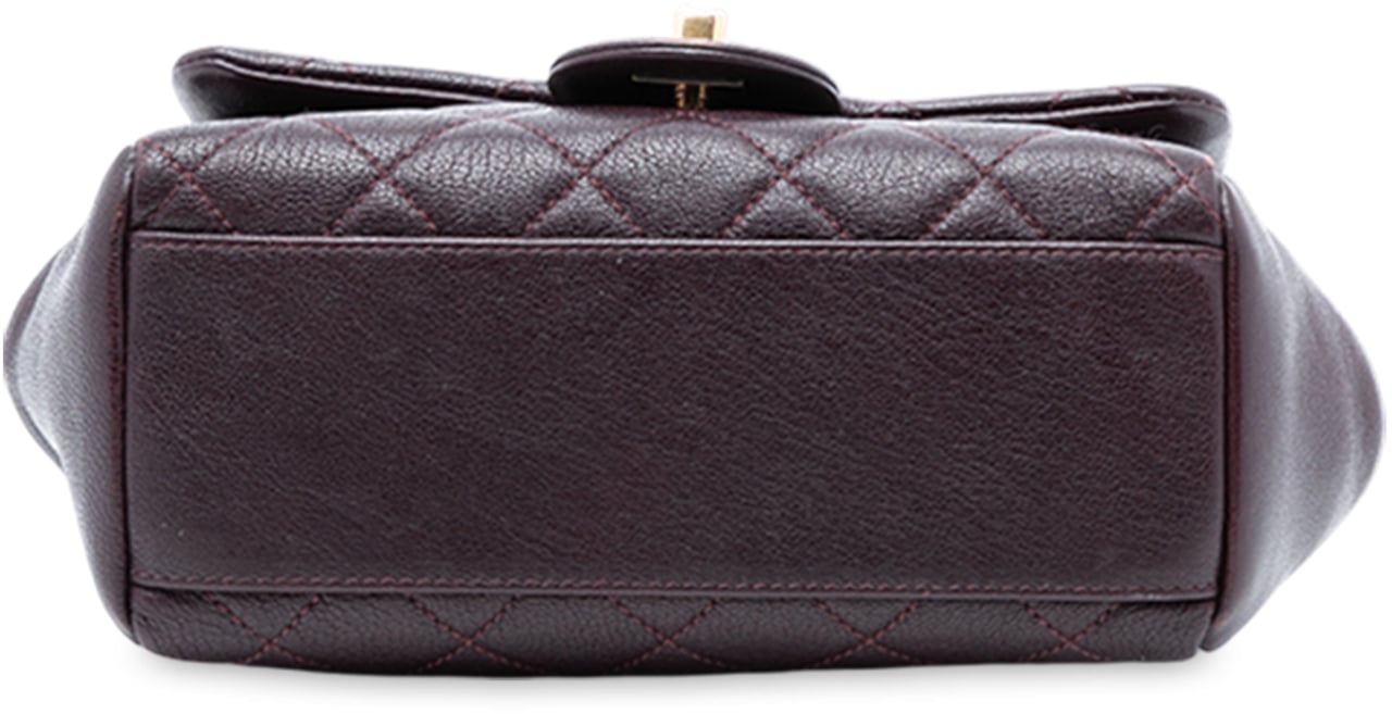 Chanel Mini Quilted Sheepskin Trapezio Flap Rood