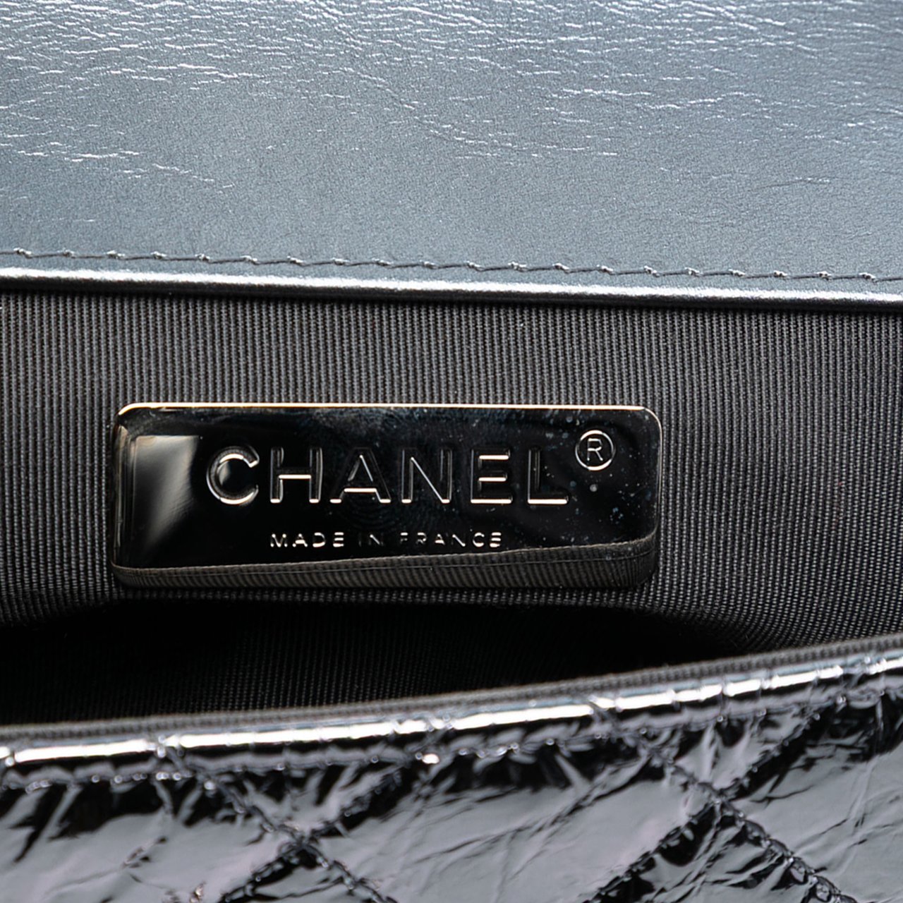 Chanel Mini Quilted Metallic Calfskin Ring Top Handle Flap Zilver