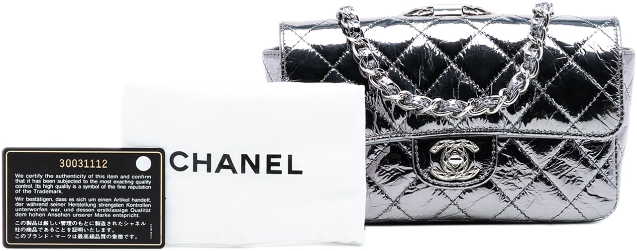 Chanel Mini Quilted Metallic Calfskin Ring Top Handle Flap Zilver