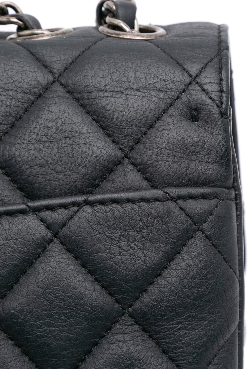 Chanel Small Quilted Grained Calfskin CC Round Clasp Accordion Flap Zwart