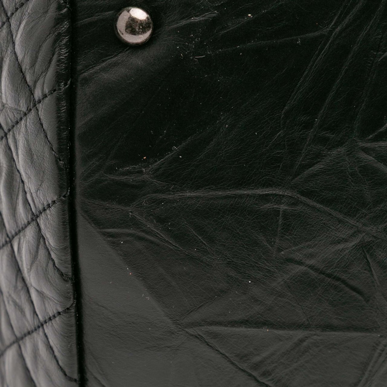 Chanel CC Quilted Aged Calfskin Coco Rider Bowling Bag Zwart