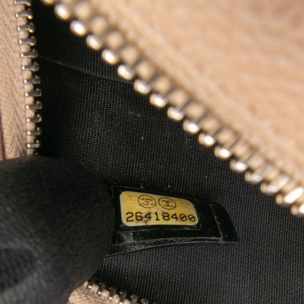 Chanel Caviar CC Filigree Round Crossbody Bruin