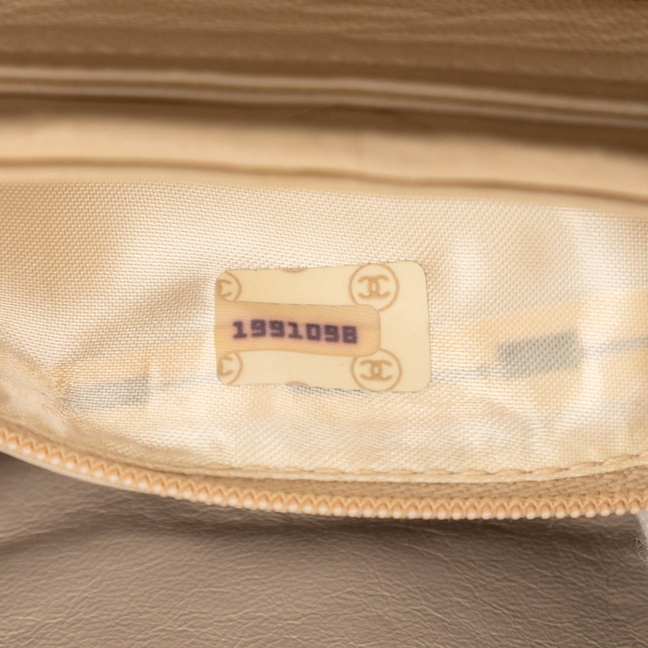 Chanel CC Quilted Lambskin Tassel Chain Vanity Bag Bruin