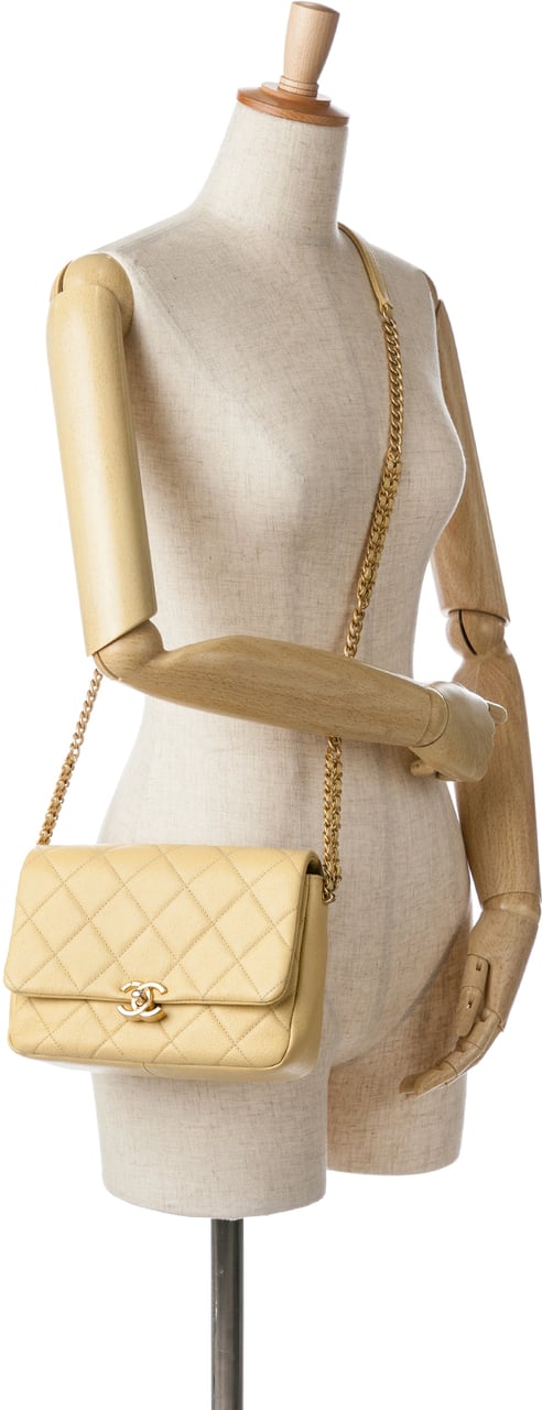 Chanel Small Quilted Caviar Chain Melody Flap Geel
